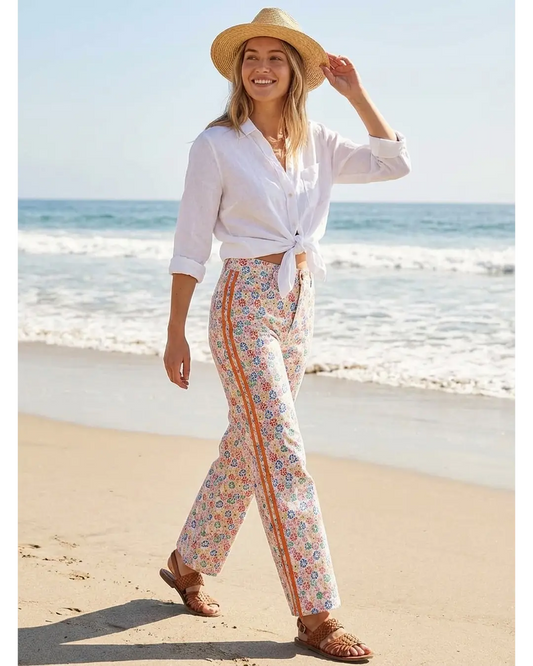 JEANS COM ESTAMPAGEM FLORES