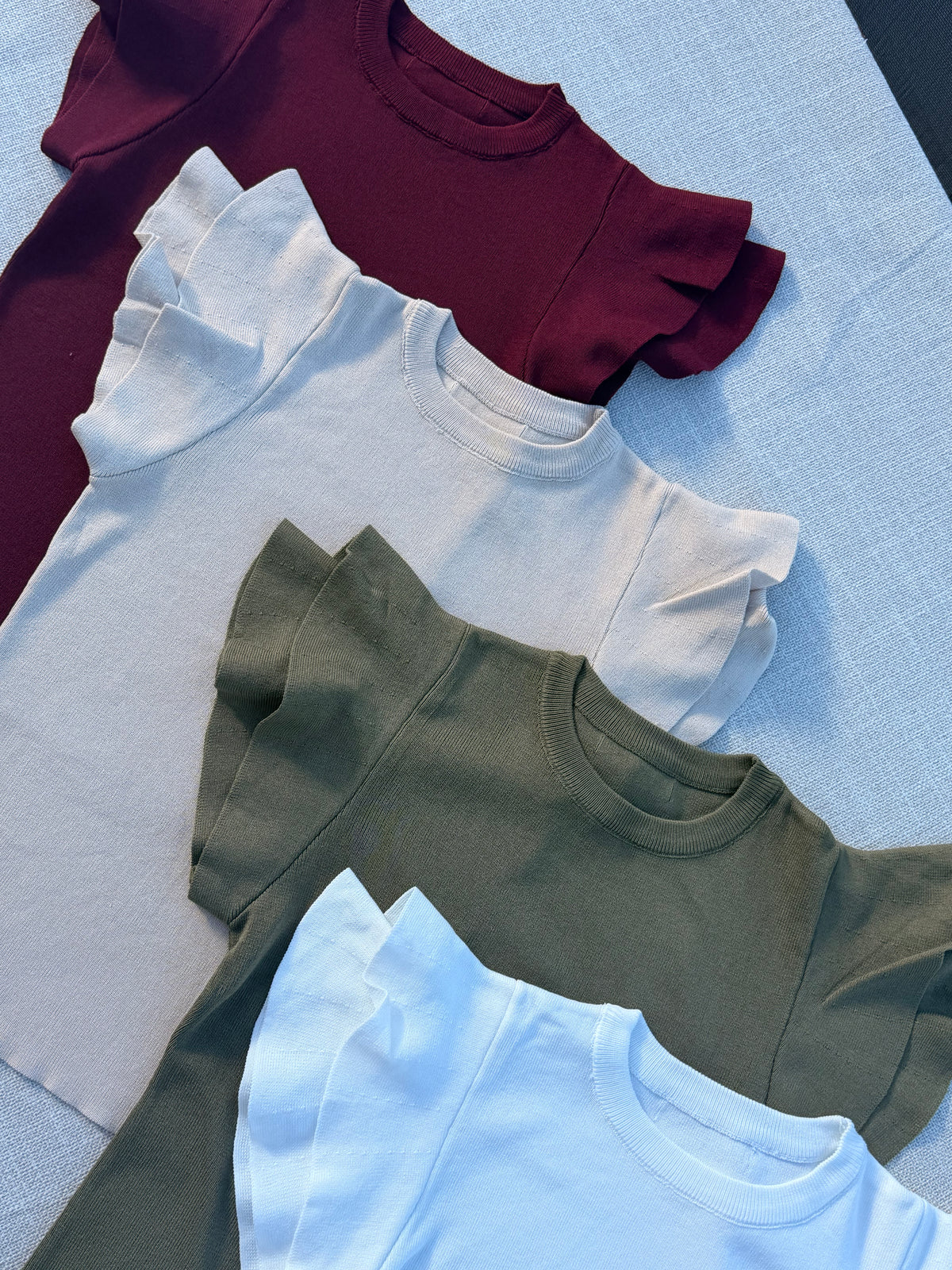 BLUSA CANELADA COM FOLHOS